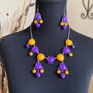 5/$15 Purple and gold necklace and earring set. In good used condition